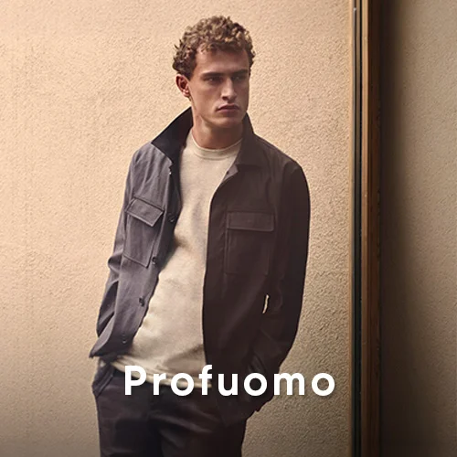 Man in donkere Profuomo overshirt gecombineerd met crème trui
